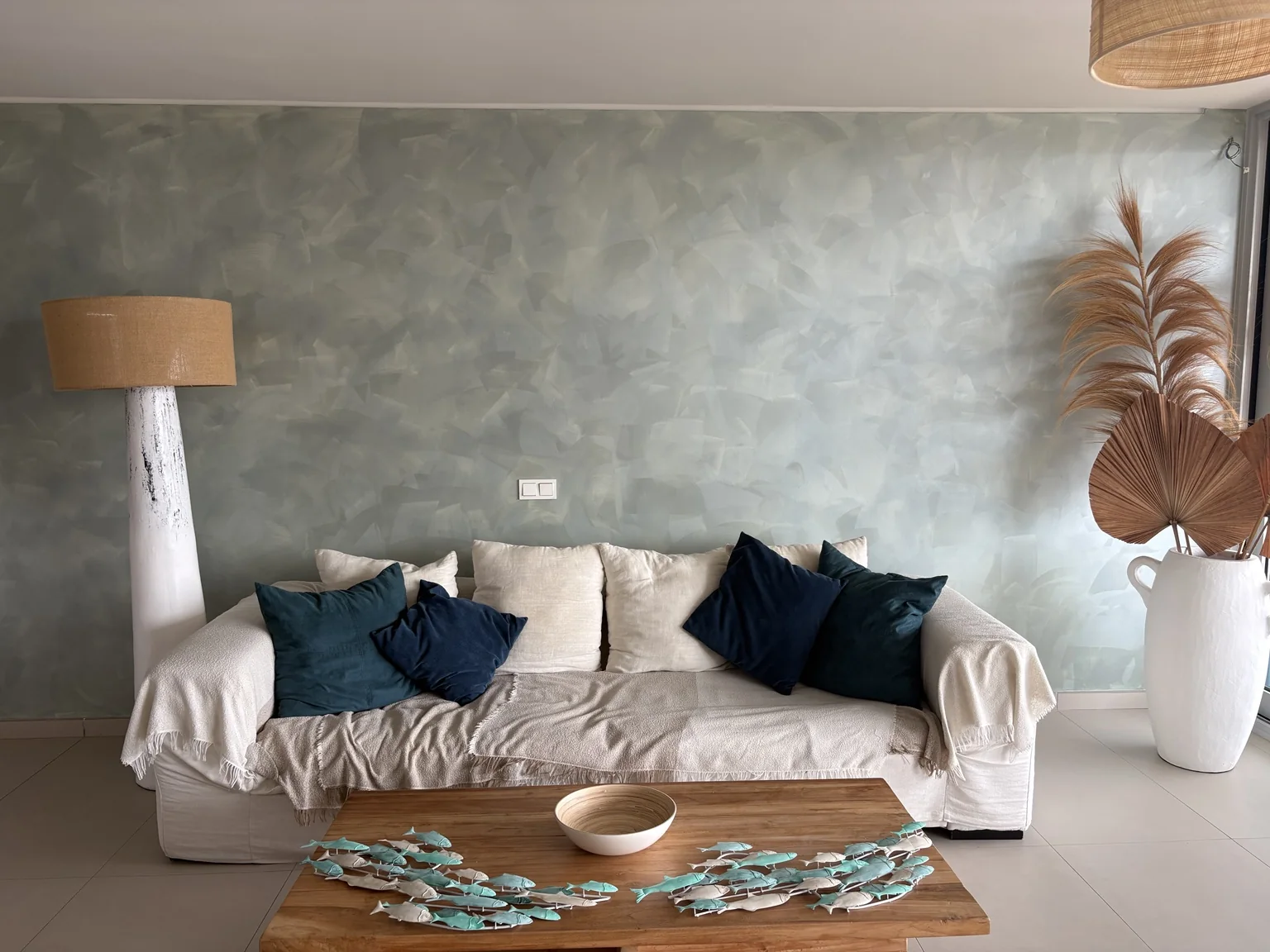 Soft sage decorative wall finish in a living room