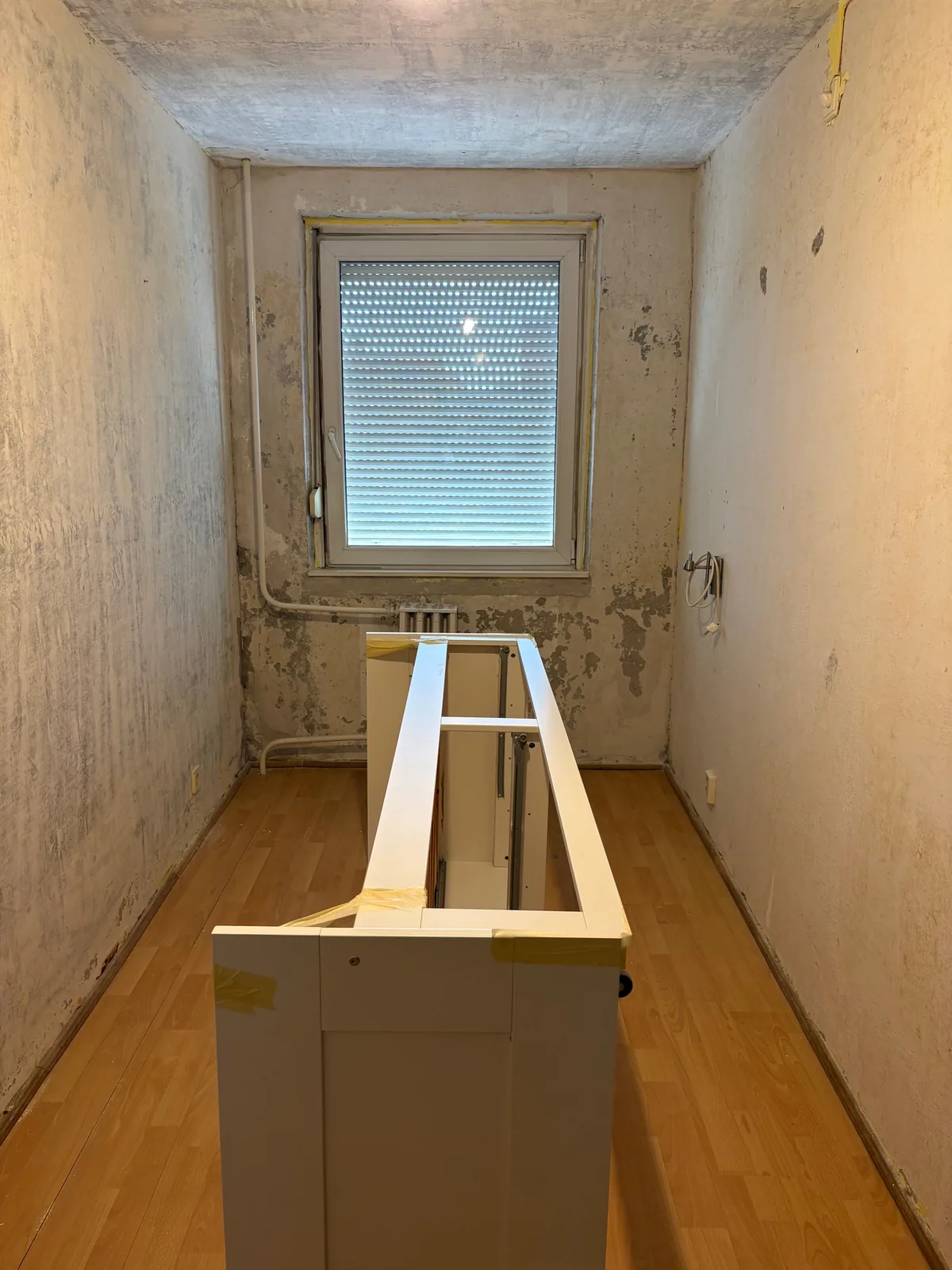 Wall after wallpaper removal before restoration