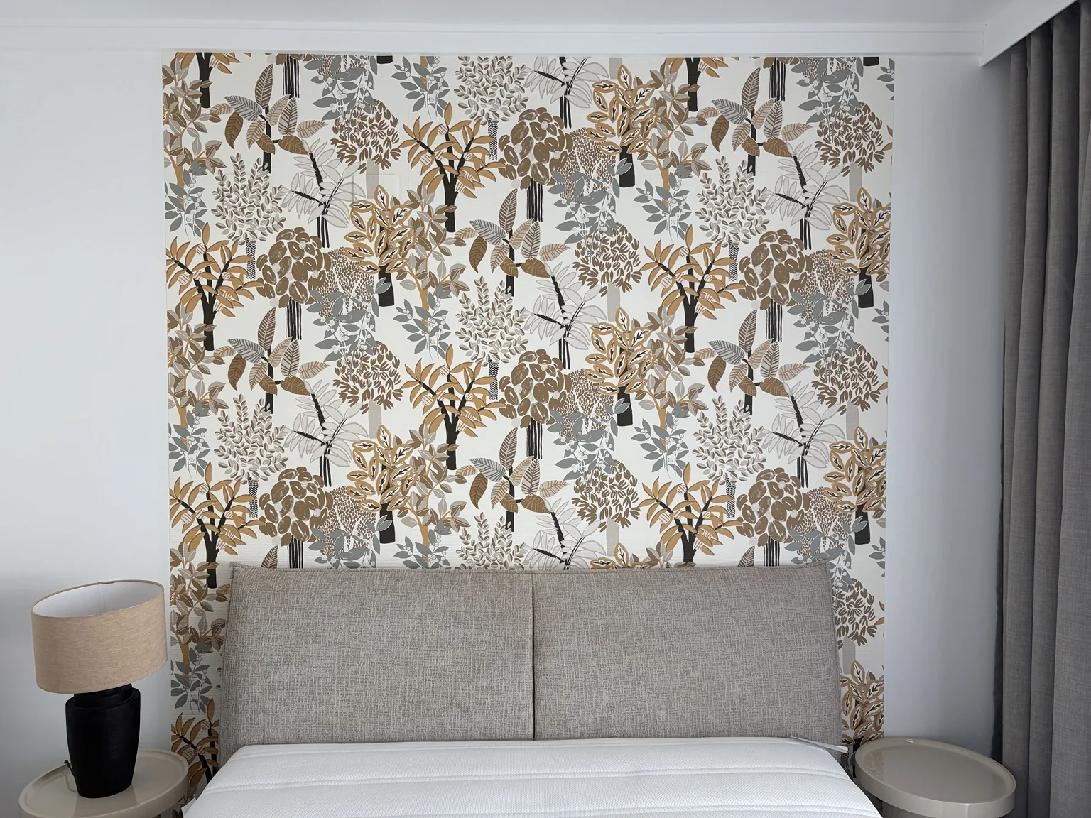 Botanical feature wallpaper installed in a bedroom